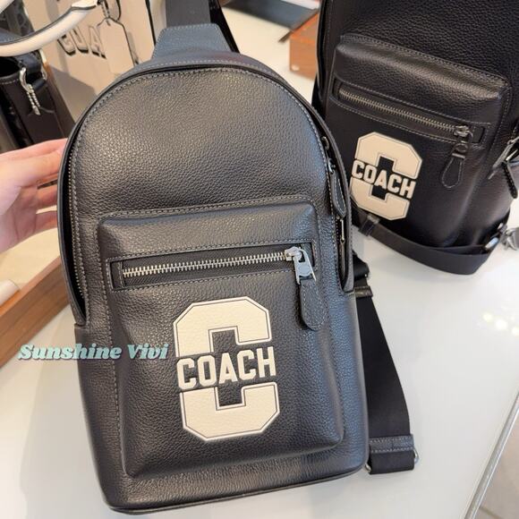 NWT COACH CAJ60 West Pack Varsity Motif Pebble Smooth Leather Black/Chalk - Picture 1 of 10